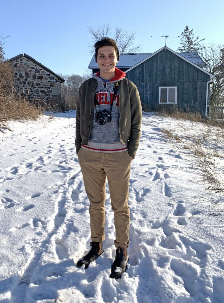 Photograph of student Hossam Ehab standing outside in the snow.