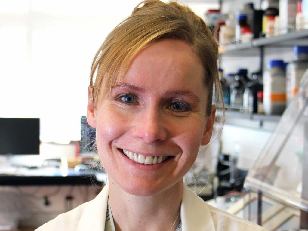 A picture of Dr. Sarah Wootton in a lab