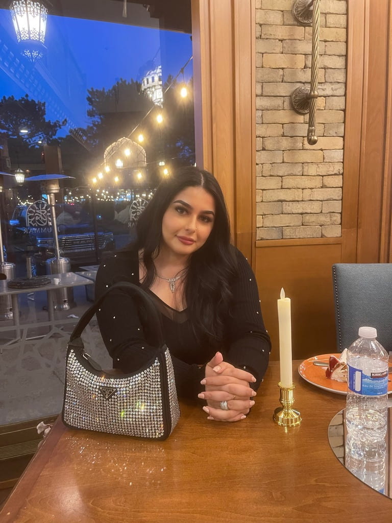 A photo of Midia Mohammed in a resturant